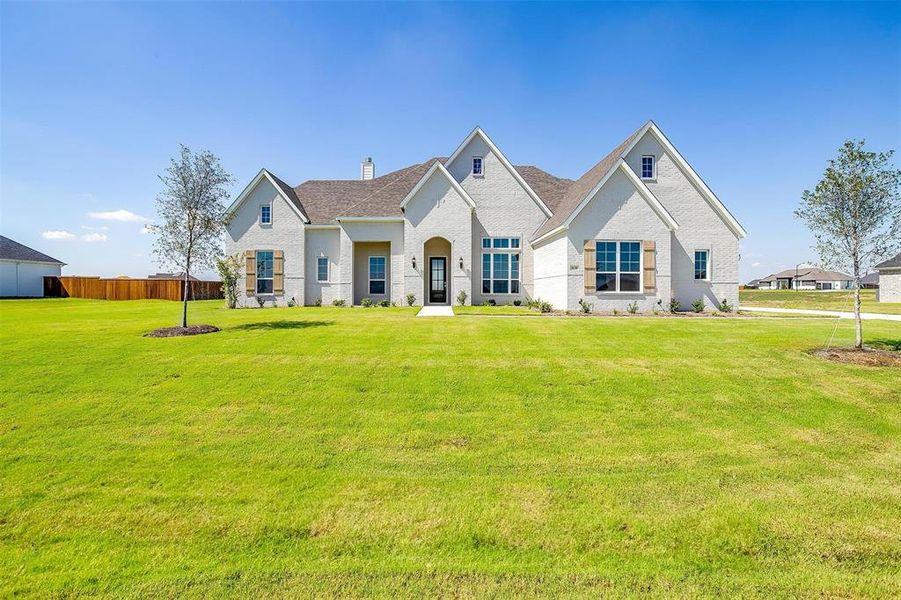 View of front of home with a front yard