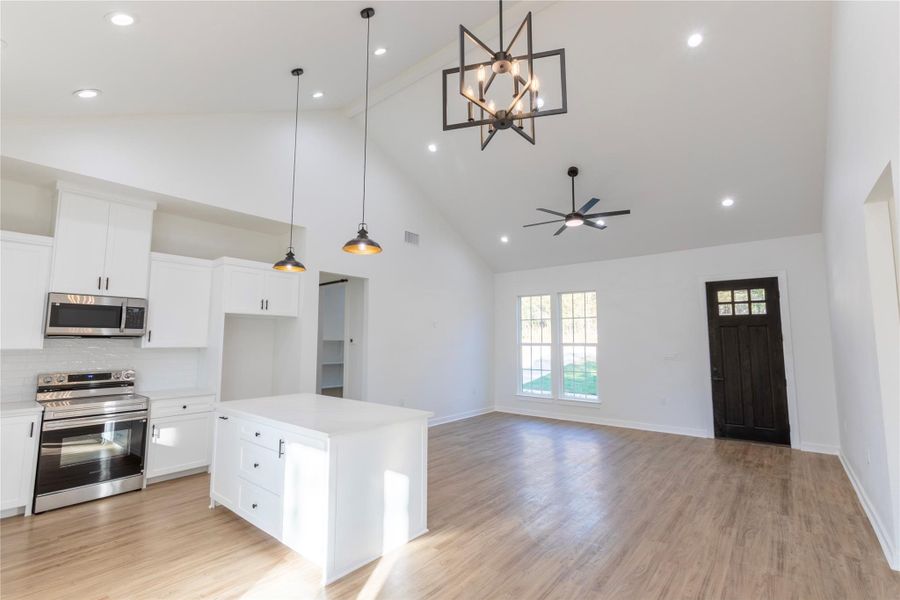 Tall ceilings bring sophistication and style to the space.