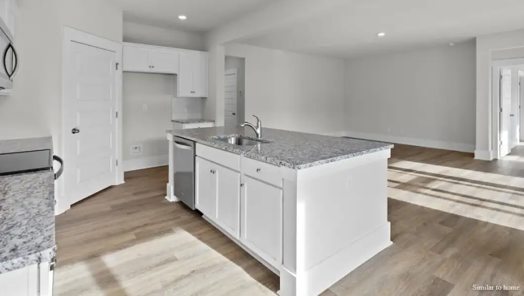 Furnished interior view inside a new home in The Highlands at Cedar Hill Landing, Navassa (Image 7).