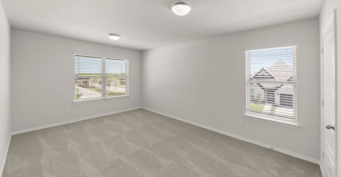 Representative exterior photo of a completed home built from the Raleigh by Impression Homes in Baker Farms, Cleburne, TX (Image 12).