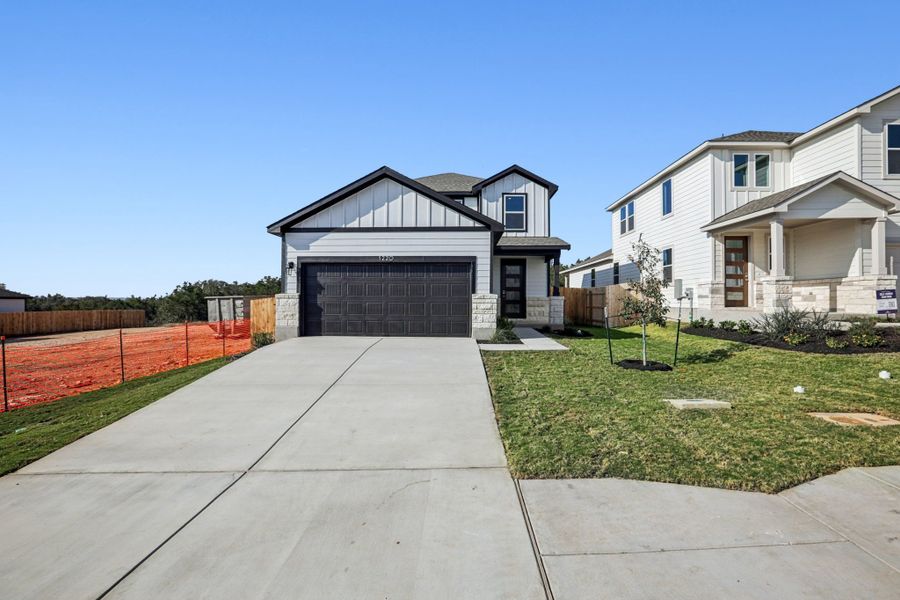 A sidewalk and a building.