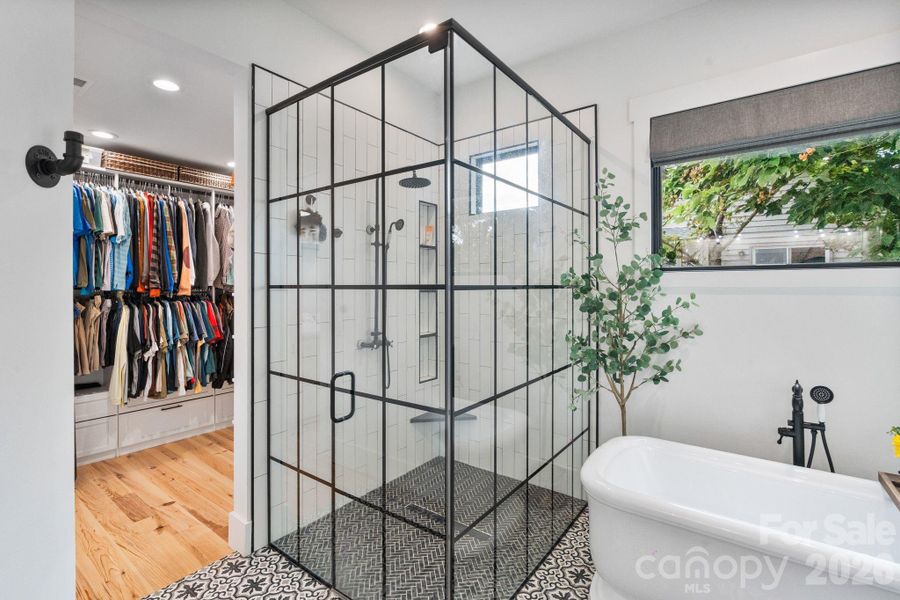 Glass and black grid shower enclosure creates a bold and modern look Glass and black grid shower enclosure creates a bold and modern look