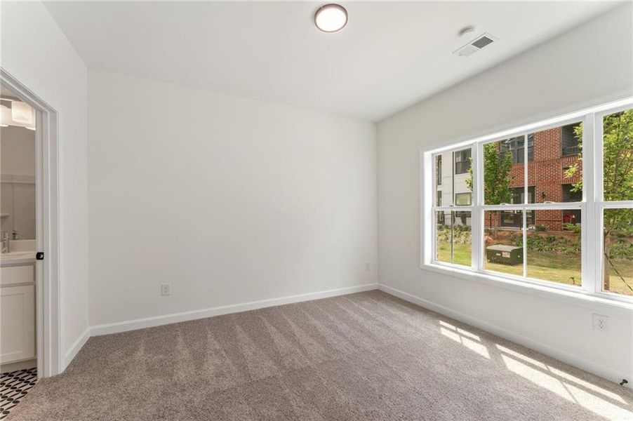 Spacious, unfurnished interior of a new home in Townes at South Main, Kennesaw (Image 19).