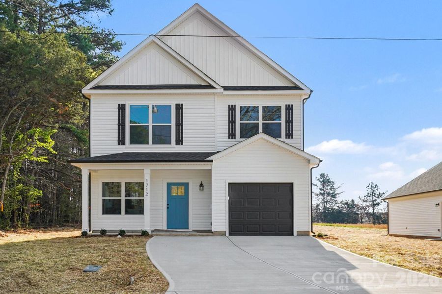 Front exterior of a new home in , Kannapolis, NC, highlighting curb appeal (Image 2). Front exterior of a new home in , Kannapolis, NC, highlighting curb appeal (Image 2).