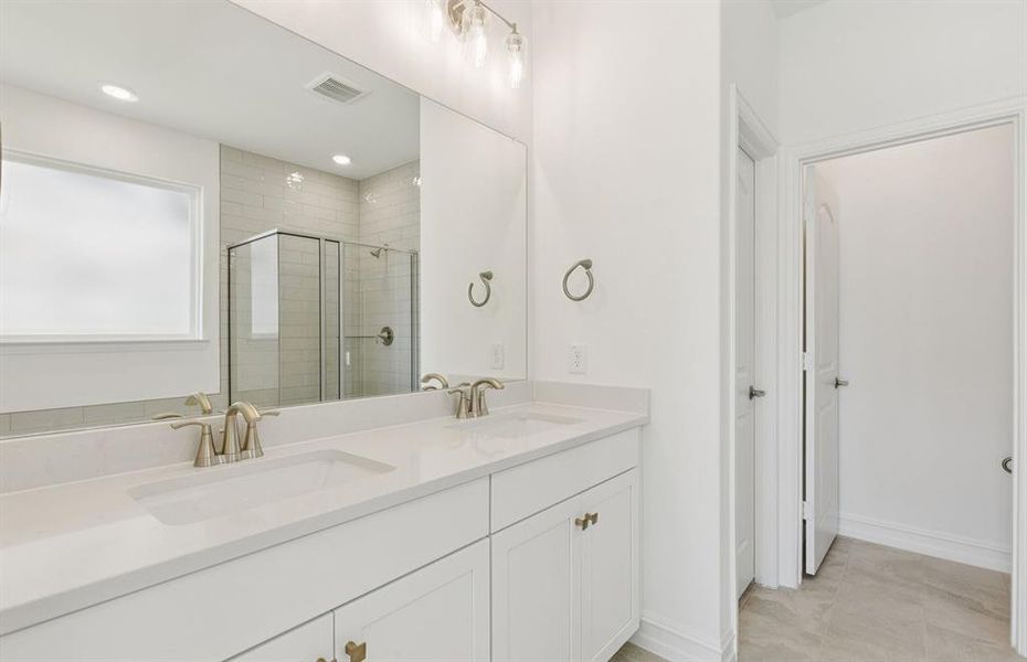 Owner's private bath with double sinks