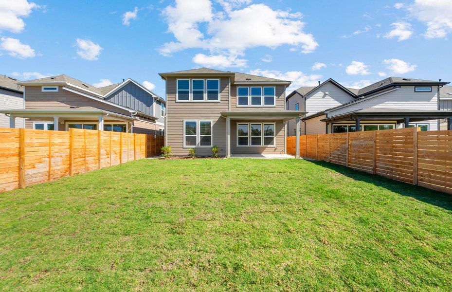 Exterior details and patio area of a home in Horizon Lake, Leander (Image 17).
