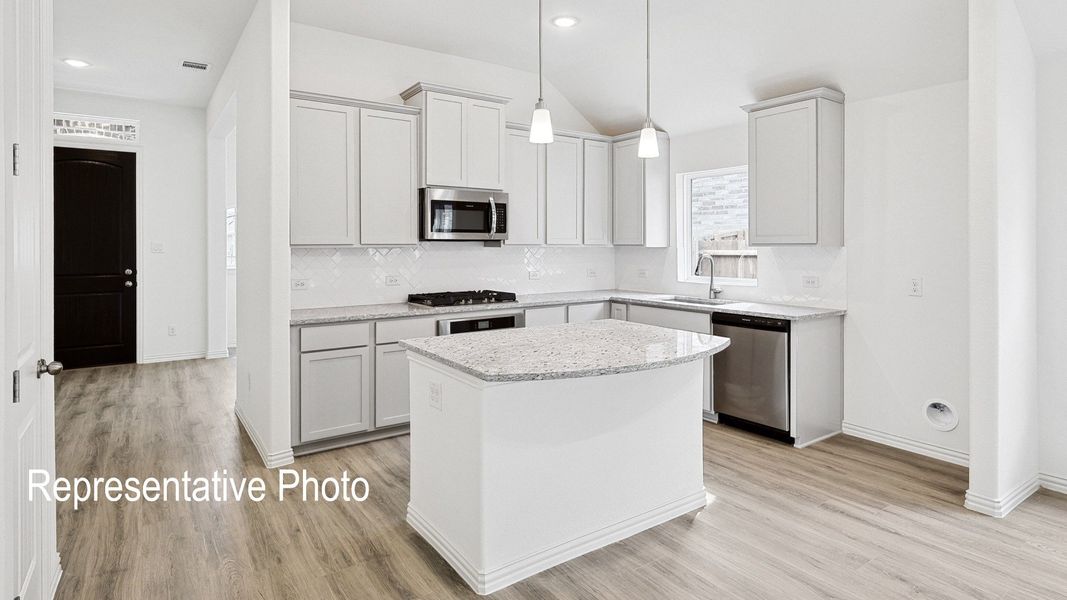Furnished interior view inside a new home in Green Meadows Premier, Celina (Image 3).
