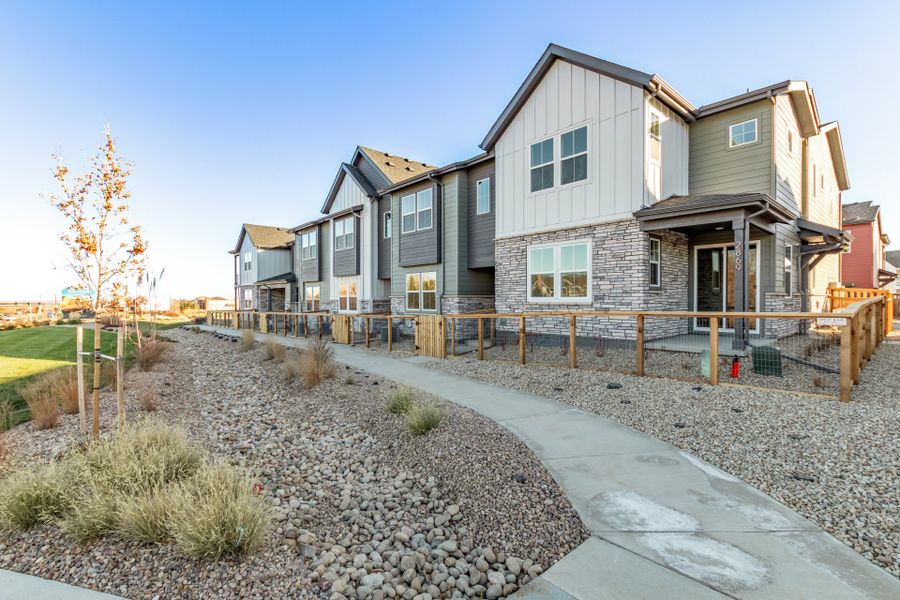 Front exterior of a new home in Arras Park, Thornton, CO, highlighting curb appeal (Image 2).