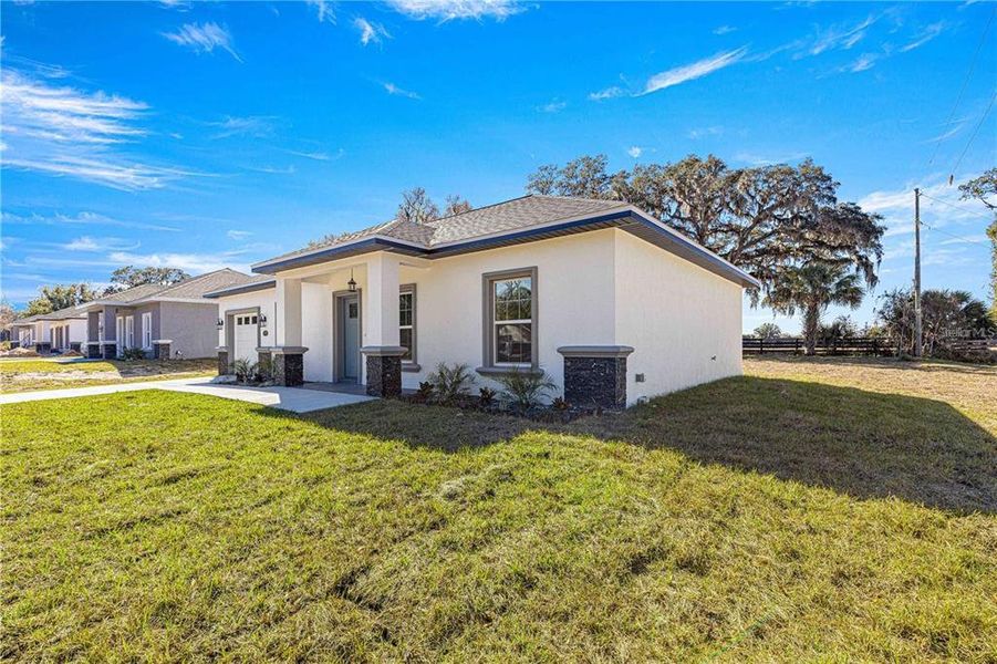 Exterior details and patio area of a home in , Summerfield (Image 4).