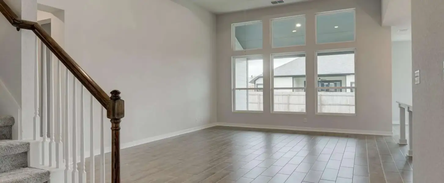 Representative unfurnished interior of a home built from the Guadalupe by Ashton Woods in Saddlebrook Ranch, Schertz (Image 13).