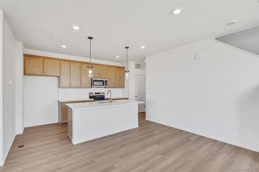 Furnished interior view inside a new home in Turnberry, Commerce City (Image 8).