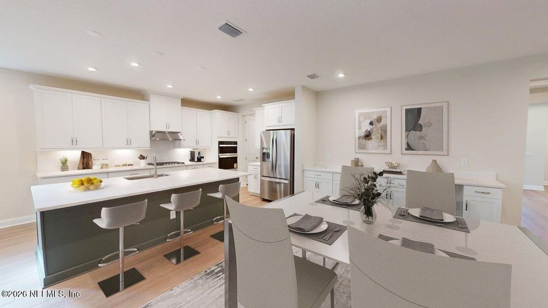 Furnished interior view inside a new home in RiverTown - WaterSong, St. Johns (Image 9).