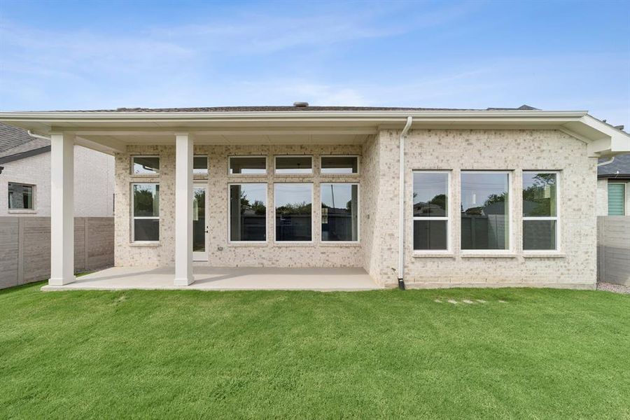 Exterior details and patio area of a home in Painted Tree - Classic Series, McKinney (Image 2). Exterior details and patio area of a home in Painted Tree - Classic Series, McKinney (Image 2).