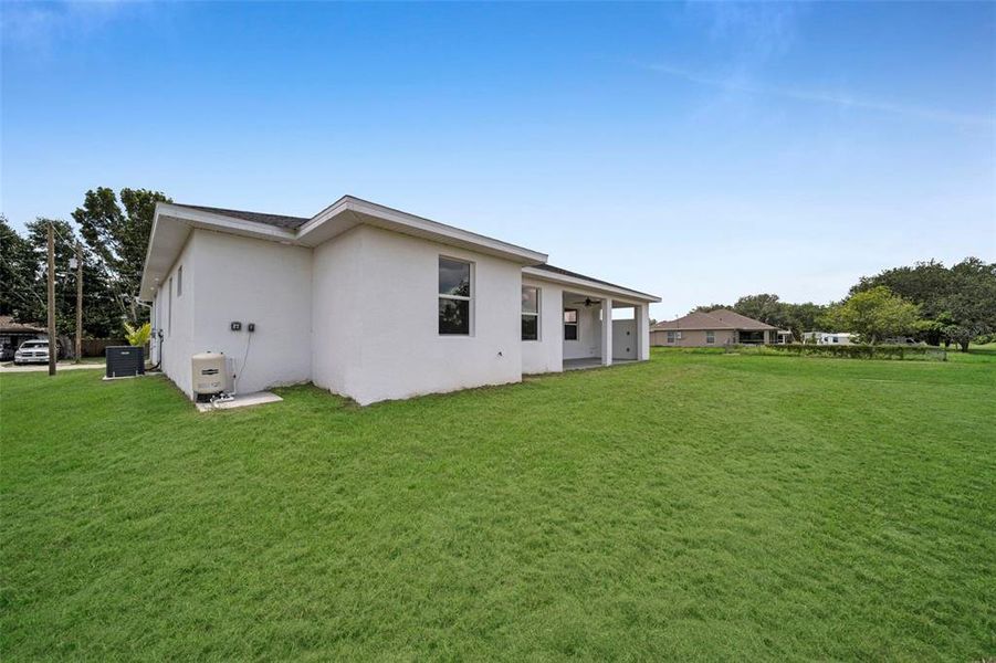 Exterior details and patio area of a home in , Lehigh Acres (Image 4).