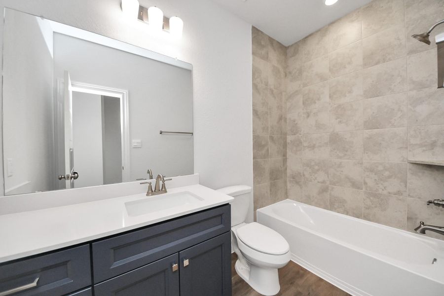 Furnished interior view inside a new home in Lexington Heights, Willis (Image 10).