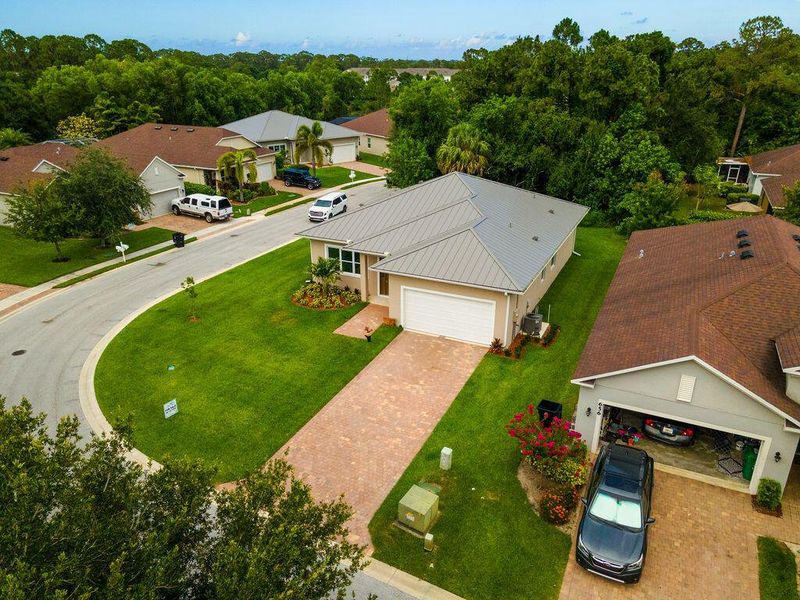 Front exterior of a new home in , Port St. Lucie, FL, highlighting curb appeal (Image 16).