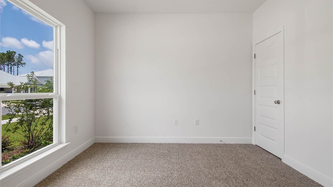 Representative unfurnished interior of a home built from the Kennedy by D.R. Horton in Bayside at Ward Creek, Panama City Beach (Image 35).