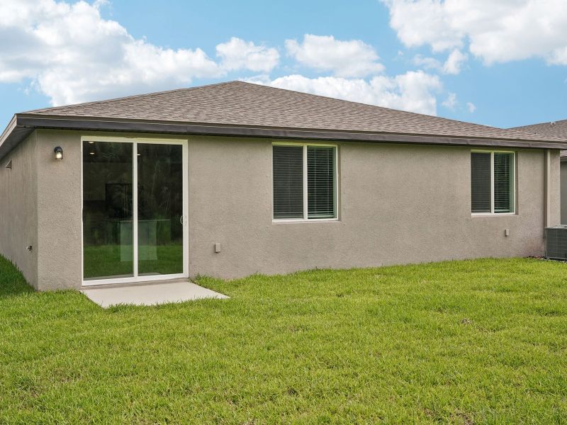 Exterior details and patio area of a home in Salt Meadows - Classic Series, Parrish (Image 3).
