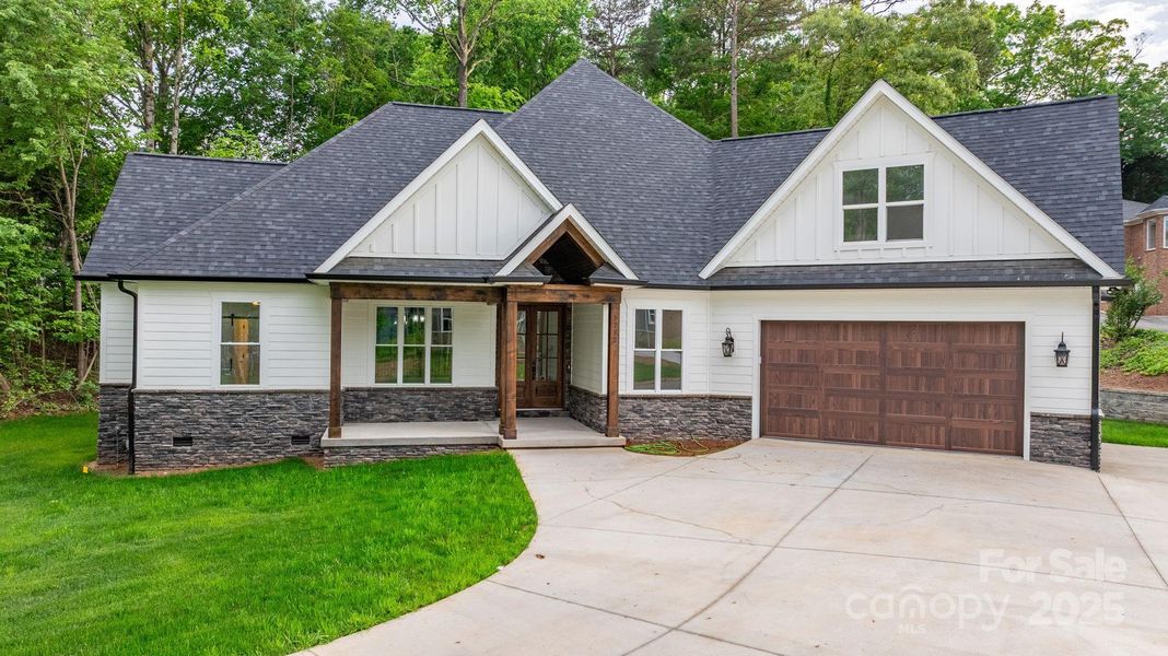 Front exterior of a new home in , Hickory, NC, highlighting curb appeal (Image 28).