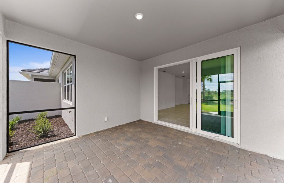Exterior details and patio area of a home in TerraWalk at Babcock Ranch, Alva (Image 21).