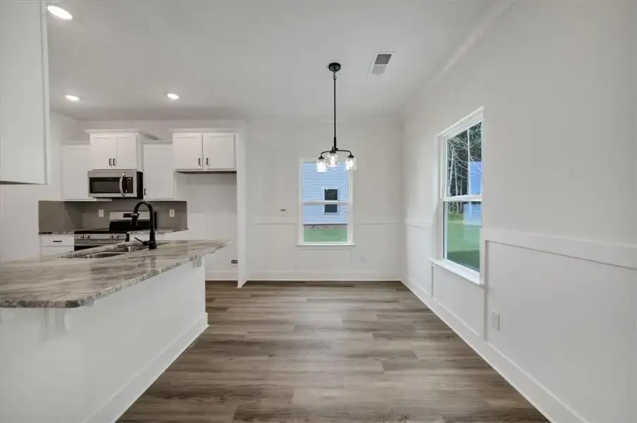 Furnished interior view inside a new home in Canterbury Villas, Carrollton (Image 5).