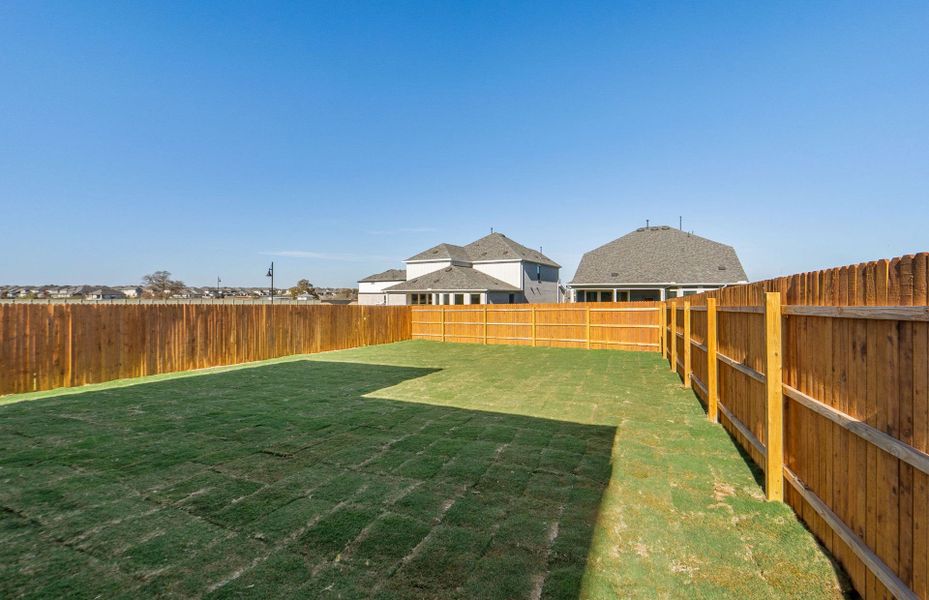 Exterior details and patio area of a home in Santa Rita Ranch, Liberty Hill (Image 24).