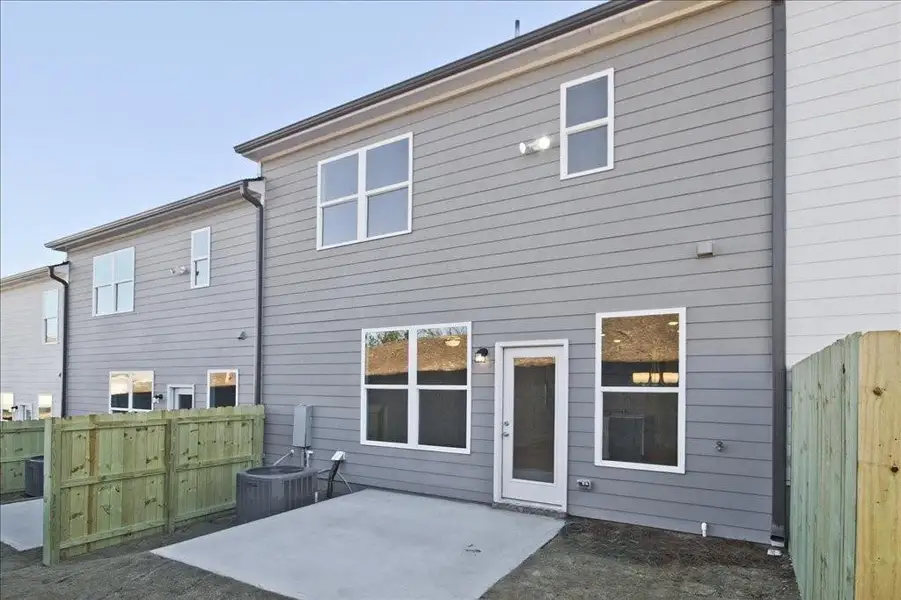 Exterior details and patio area of a home in Somerset at Riverbrook, Gainesville (Image 21).