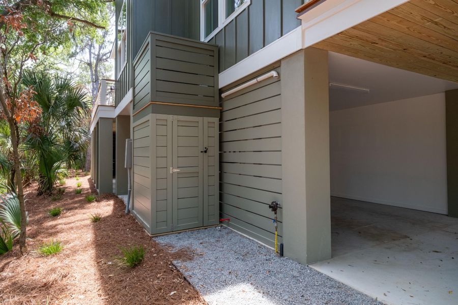 Exterior details and patio area of a home in , Edisto Island (Image 31).