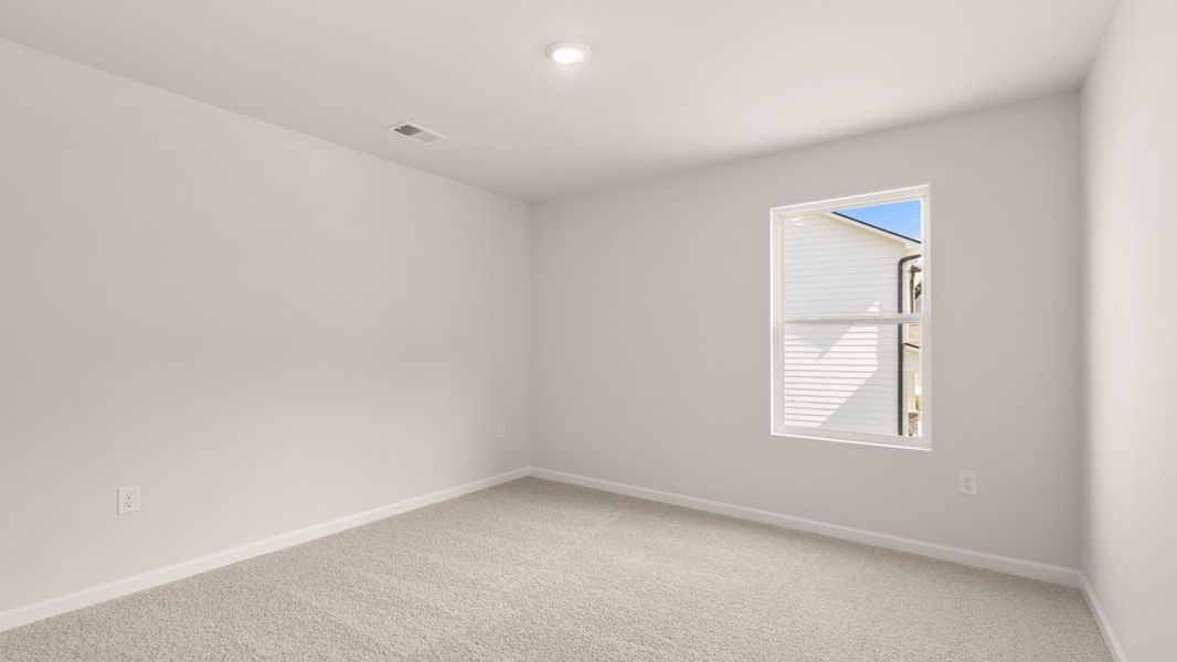 Representative unfurnished interior of a home built from the Halton by D.R. Horton in Liberty Crossing, Braselton (Image 25).