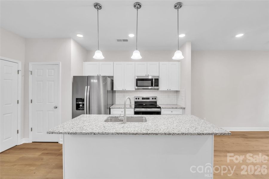 Furnished interior view inside a new home in , Statesville (Image 16).
