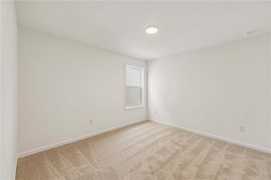 Spacious, unfurnished interior of a new home in Eastlyn Crossing, Flowery Branch (Image 26).