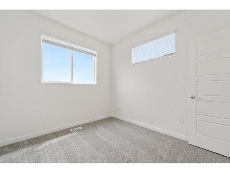 Spacious, unfurnished interior of a new home in Liberty Draw, Evans (Image 18).