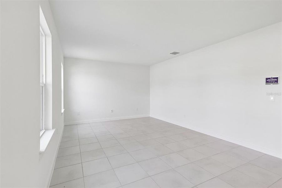 Spacious, unfurnished interior of a new home in Grasslands West, Lakeland (Image 16).