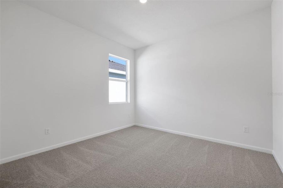 Spacious, unfurnished interior of a new home in Brystol North at Wylder, Port St. Lucie (Image 14).