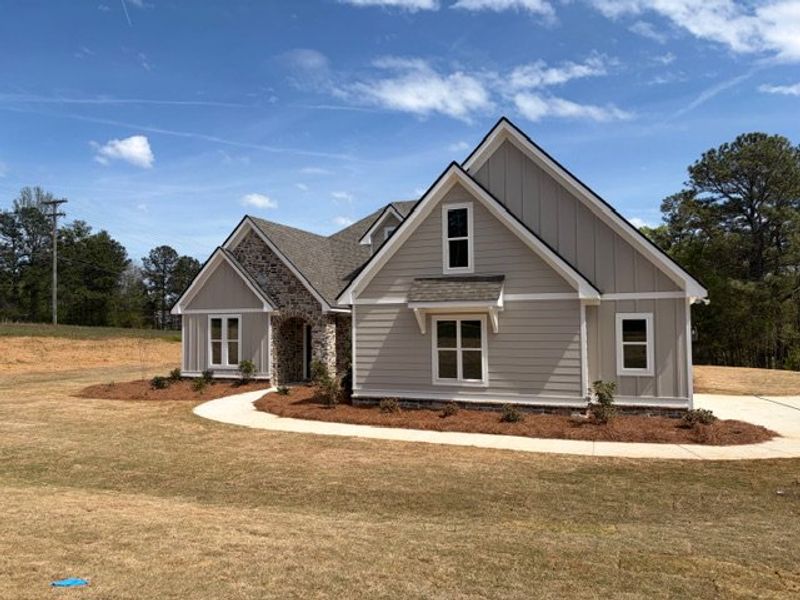 Front exterior of a new home in Hwy 16 South - Carrollton, Carrollton, GA, highlighting curb appeal (Image 2). Front exterior of a new home in Hwy 16 South - Carrollton, Carrollton, GA, highlighting curb appeal (Image 2).
