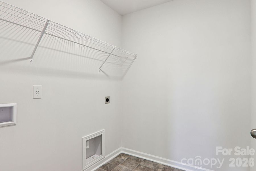 Spacious, unfurnished interior of a new home in Rydele Heights, Asheville (Image 33).