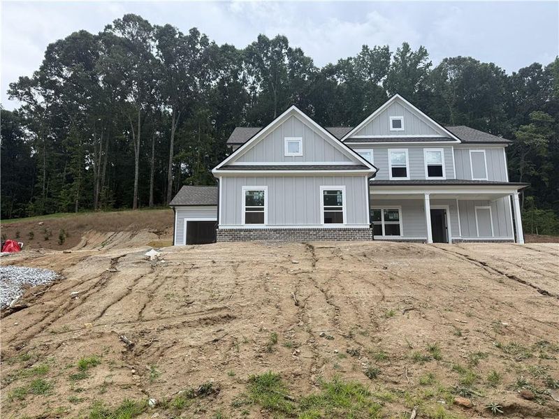In-progress construction of a new home in Woodland Hills, Loganville, GA (Image 1). In-progress construction of a new home in Woodland Hills, Loganville, GA (Image 1).