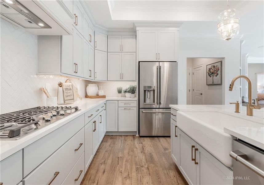 Furnished interior in a model home at The Courtyards by The Manor in Alpharetta (Image 28).