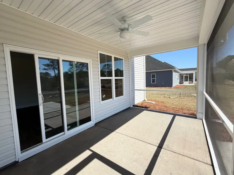 Exterior details and patio area of a home in , Shallotte (Image 3).