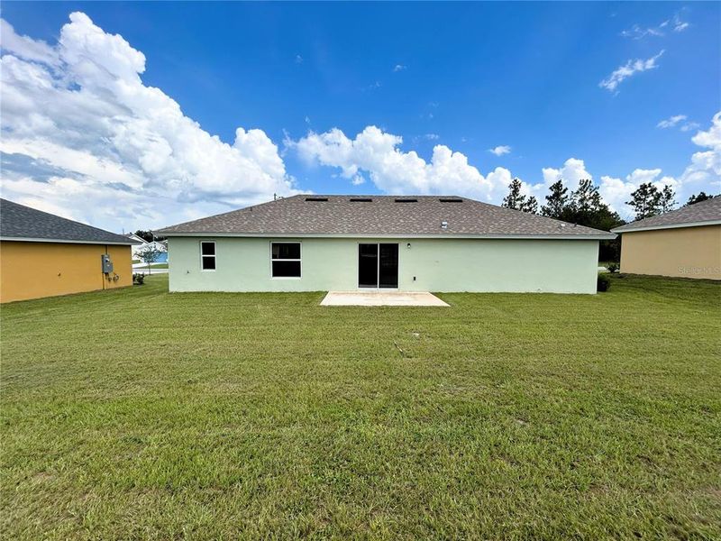 Front exterior of a new home in , Citrus Springs, FL, highlighting curb appeal (Image 1).