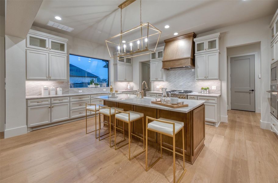 Glass door display over the entire kitchen cabinetry. Glass door display over the entire kitchen cabinetry.
