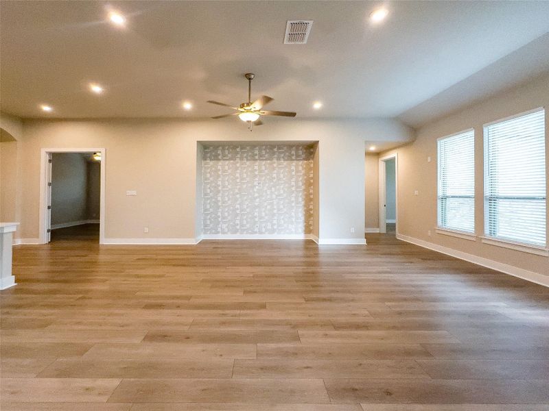 Spare room with recessed lighting, light wood finished floors, and ceiling fan Spare room with recessed lighting, light wood finished floors, and ceiling fan