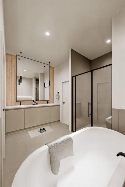 Primary bathroom with double sinks, separate STEAM shower and tub.