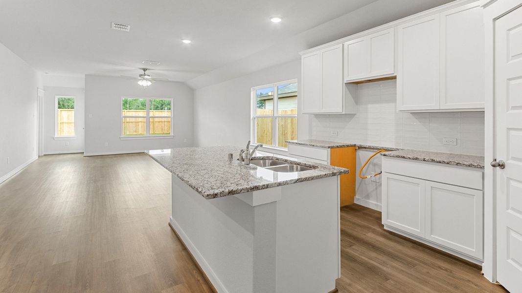 Representative furnished interior of a home built from the Kimbell by Brightland Homes in Sunterra, Katy (Image 8).