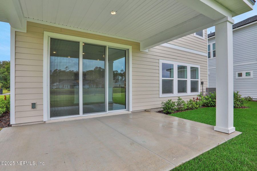 Exterior details and patio area of a home in TrailMark, St. Augustine (Image 22).