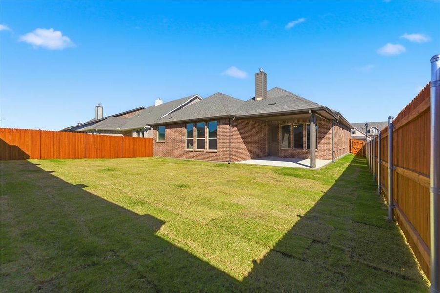 Exterior details and patio area of a home in Northstar, Haslet (Image 21).