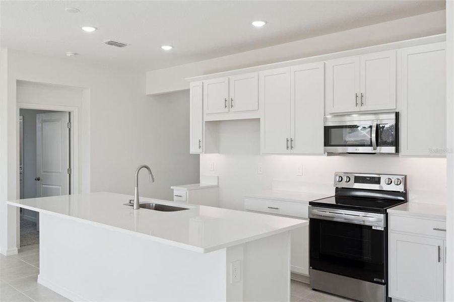 Furnished interior view inside a new home in Eden Crest, Apopka (Image 6).