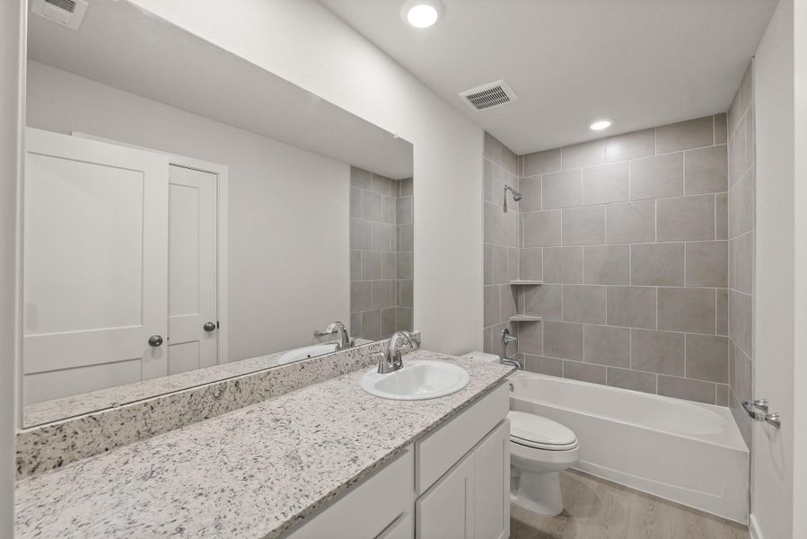 Furnished interior view inside a new home in Lakes at Crockett Martin, Conroe (Image 9).