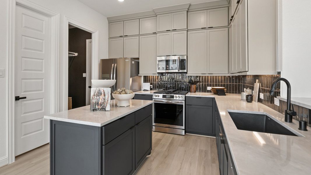 Representative furnished interior of a home built from the Mimosa by Brightland Homes in Sunterra, Katy (Image 13).