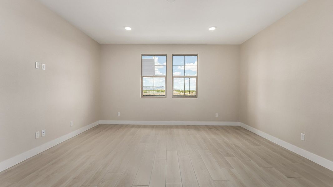 Representative furnished interior of a home built from the The Delaney by DRB Homes in Surprise City Center, Surprise (Image 7).